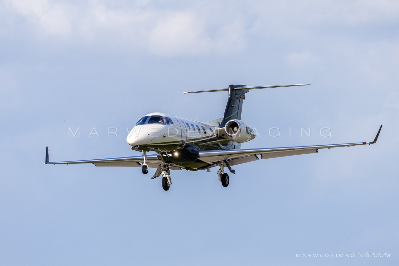 Embraer Phenom 300 N395FX photographed at KBCT on 2025-02-16