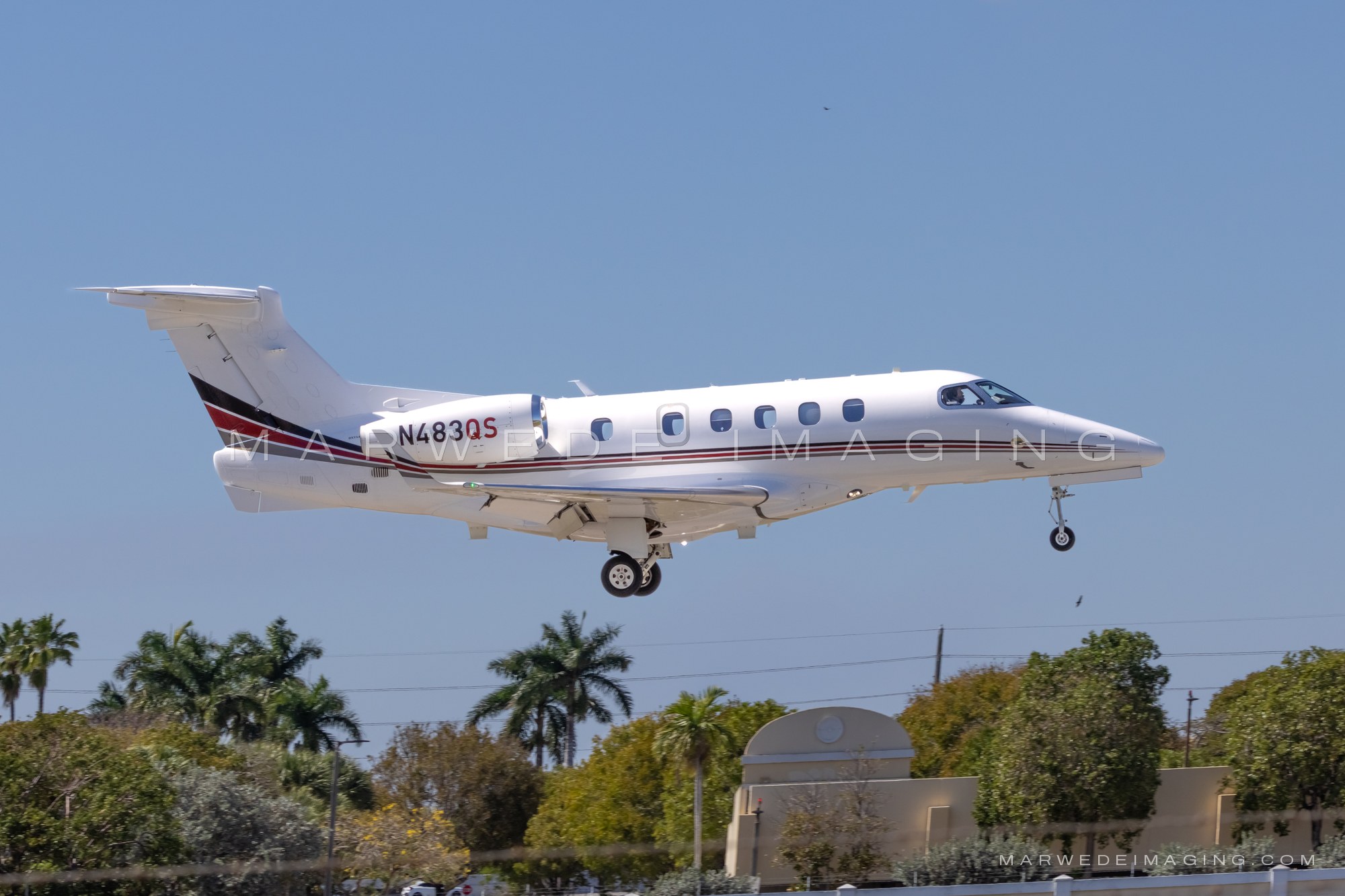 Embraer Phenom 300 N483QS photographed at KBCT on 2026-03-22